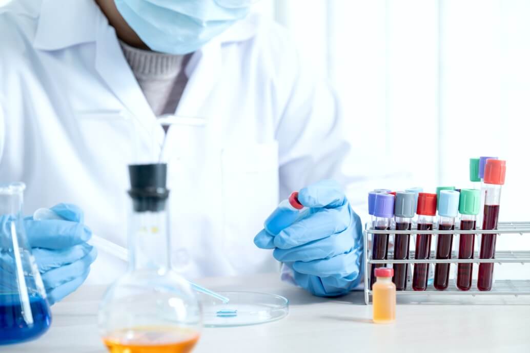 scientists-hold-the-pipette-and-drop-the-blue-chemical-liquid-for-research-and-analysis-in-a_t20_3gVBbo (1)